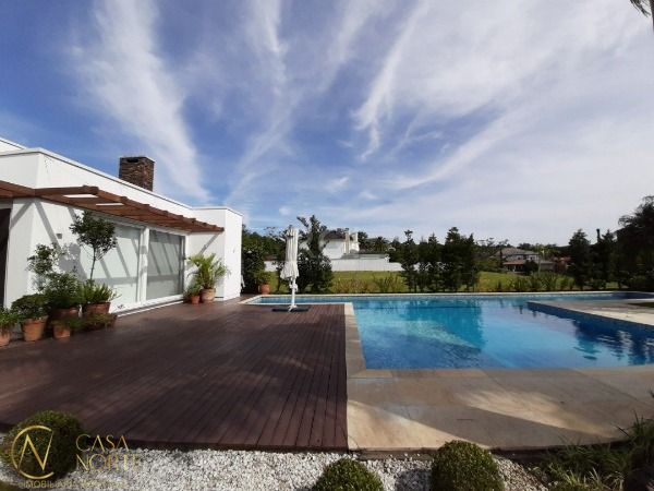 Casa de Condomínio à venda com 3 quartos, 320m², 3 suítes, 4 vagas, Avenida Juca Batista no bairro Belém Novo em Porto Alegre
