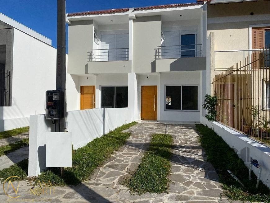 Casa à venda com 3 quartos, 126m², 3 suítes, 2 vagas, Rua Itacyr Rossi no bairro Guarujá em Porto Alegre