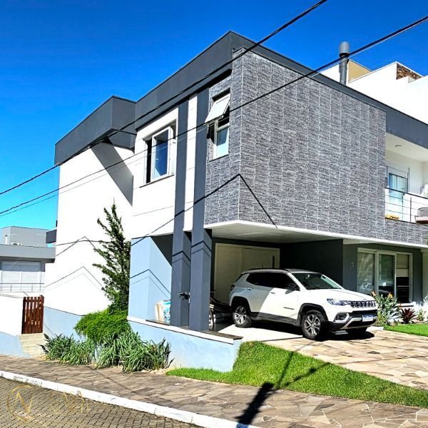 Casa de Condomínio à venda com 3 quartos, 230m², 3 suítes, 2 vagas, Rua Ivo Walter Kern no bairro Aberta dos Morros em Porto Alegre