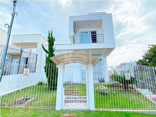 Casa à venda com 3 quartos, 208m², 1 suíte, 2 vagas, Avenida Altos do Santa Rita no bairro Aberta dos Morros em Porto Alegre