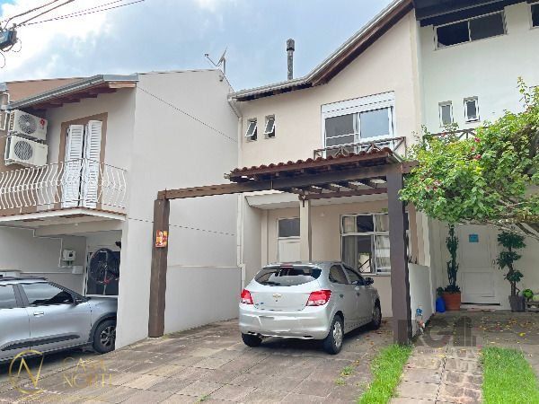 Casa de Condomínio à venda com 3 quartos, 159m², 1 suíte, 2 vagas, Estrada João Salomoni no bairro Vila Nova em Porto Alegre