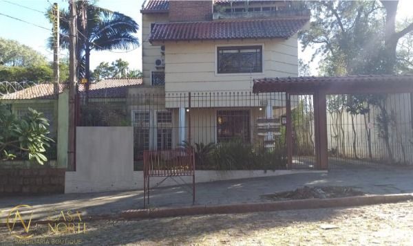 Casa de Condomínio à venda com 4 quartos, 138m², 1 vaga, Rua Upamaroti no bairro Cristal em Porto Alegre