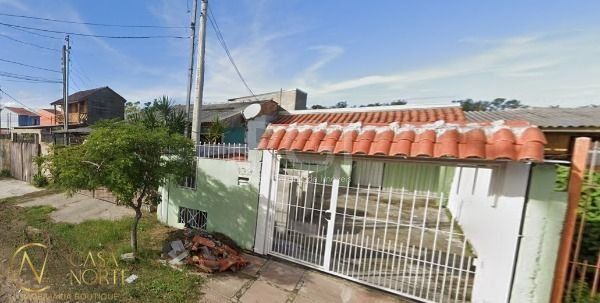 Casa à venda com 2 quartos, 136m², 1 vaga, Rua Catarina Quadros no bairro Hípica em Porto Alegre