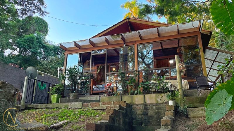 Casa à venda com 2 quartos, 140m², 2 suítes, 2 vagas, Avenida Beira Rio no bairro Belém Novo em Porto Alegre