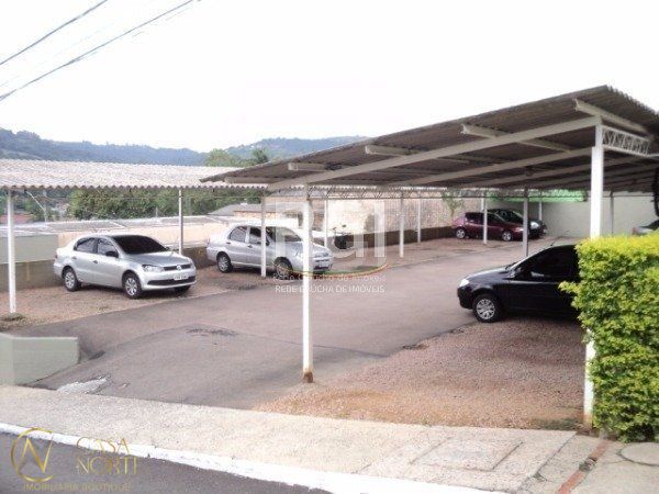 Casa de Condomínio à venda com 3 quartos, 79m², 1 vaga, Avenida Monte Cristo no bairro Vila Nova em Porto Alegre