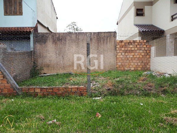 Terreno à venda  com 129m², Rua Paulo Stuart Wright no bairro Hípica em Porto Alegre