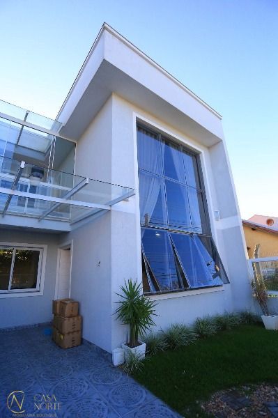 Casa à venda com 3 quartos, 140m², 2 suítes, 2 vagas, Rua Guatambu no bairro Hípica em Porto Alegre