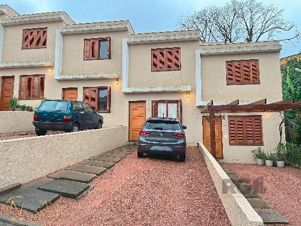 Casa de Condomínio à venda com 2 quartos, 124m², 1 suíte, 2 vagas, Rua Octávio de Souza no bairro Teresópolis em Porto Alegre