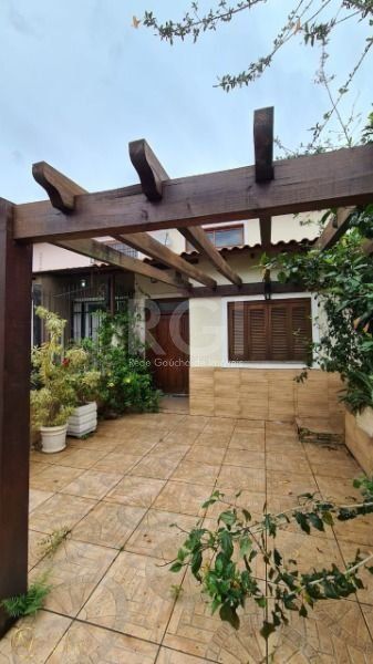 Casa à venda com 2 quartos, 100m², 1 suíte, 1 vaga, Rua Hilario Gonçalves Pinha no bairro Hípica em Porto Alegre