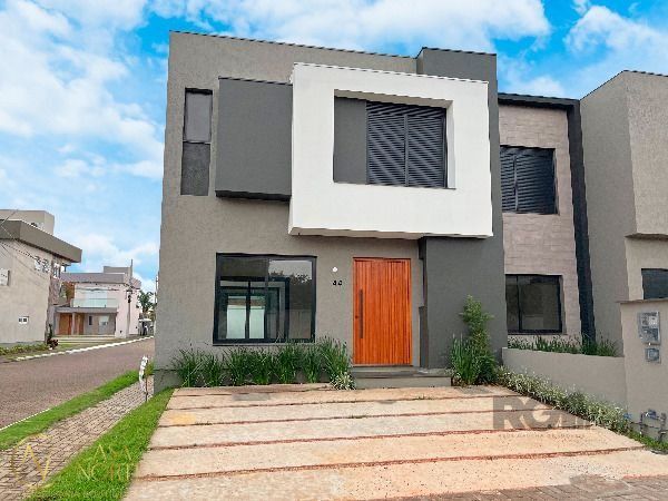Casa de Condomínio à venda com 3 quartos, 157m², 1 suíte, 2 vagas, Rua Jean Vardaramatos no bairro Hípica em Porto Alegre