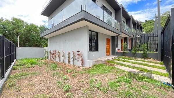 Casa de Condomínio à venda com 3 quartos, 118m², 1 suíte, 2 vagas, Rua Liberal no bairro Tristeza em Porto Alegre