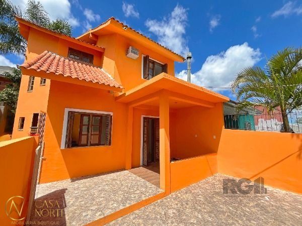 Casa à venda com 2 quartos, 144m², 2 vagas, Rua Orquidea no bairro Lomba do Pinheiro em Porto Alegre