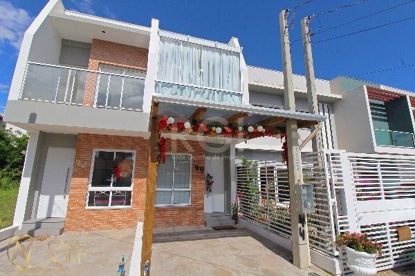 Casa à venda , 107m², 2 suítes, 1 vaga, Rua Vacaria no bairro Hípica em Porto Alegre
