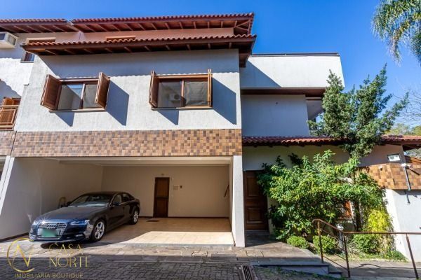 Casa de Condomínio à venda com 3 quartos, 367m², 1 suíte, 2 vagas, Travessa Pedra Redonda no bairro Jardim Isabel em Porto Alegre