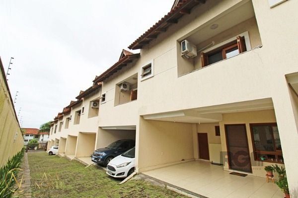 Casa de Condomínio à venda com 2 quartos, 133m², 2 vagas, Rua Liberal no bairro Tristeza em Porto Alegre