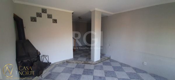 Sobrado à venda com 3 quartos, 246m², 1 suíte, 2 vagas, Rua Angelo Passuelo no bairro Vila Nova em Porto Alegre
