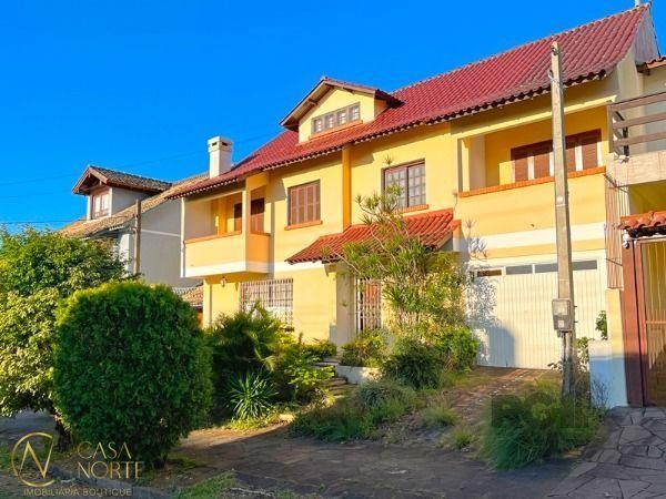 Casa à venda com 3 quartos, 320m², 1 suíte, 3 vagas, Rua Kyve T. Knijnik no bairro Espírito Santo em Porto Alegre