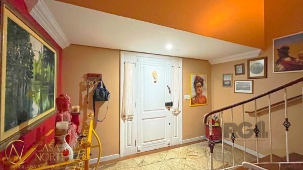 Casa de Condomínio à venda com 3 quartos, 322m², 1 suíte, 2 vagas, Rua Doutor Arnaldo da Silva Ferreira no bairro Jardim Isabel em Porto Alegre