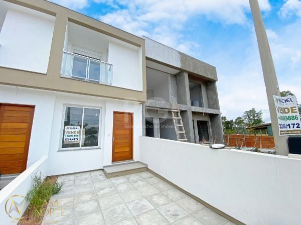 Casa à venda com 2 quartos, 90m², 2 suítes, 1 vaga, Rua Eroni Soares Machado no bairro Hípica em Porto Alegre