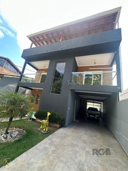 Casa à venda com 5 quartos, 513m², 1 suíte, 4 vagas, Avenida João Antônio Silveira no bairro Lomba do Pinheiro em Porto Alegre
