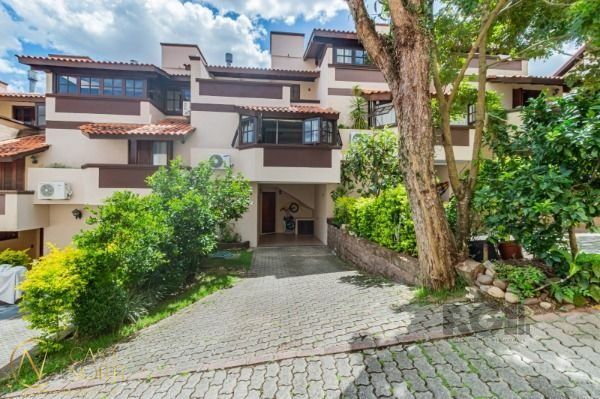 Casa de Condomínio à venda com 3 quartos, 175m², 1 suíte, 2 vagas, Avenida Wenceslau Escobar no bairro Vila Conceição em Porto Alegre