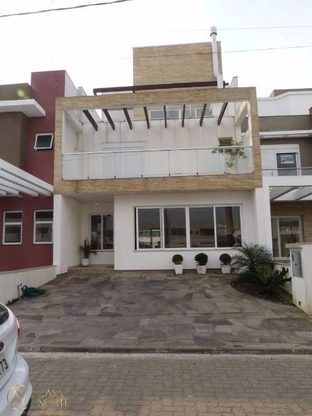 Casa de Condomínio à venda com 4 quartos, 251m², 4 suítes, 2 vagas, Rua Eroni Soares Machado no bairro Hípica em Porto Alegre