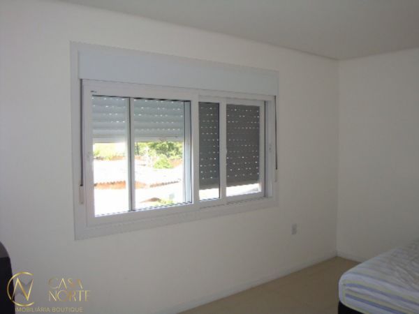 Casa à venda com 3 quartos, 353m², 1 suíte, 3 vagas, Avenida Orleaes no bairro Guarujá em Porto Alegre