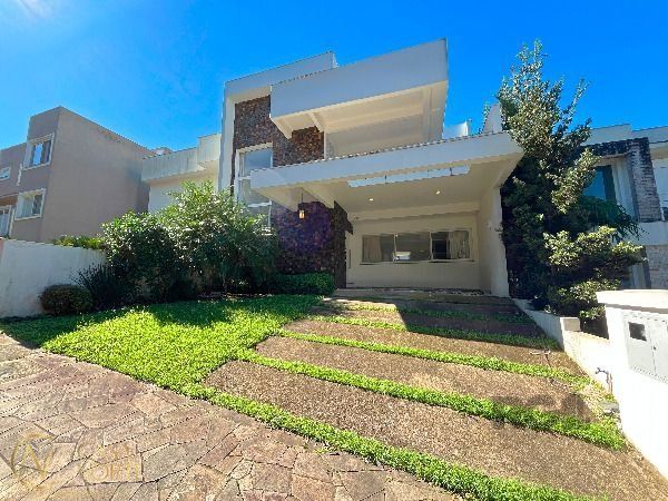 Casa de Condomínio à venda com 3 quartos, 256m², 3 suítes, 2 vagas, Rua Francisco Solano Borges no bairro Hípica em Porto Alegre