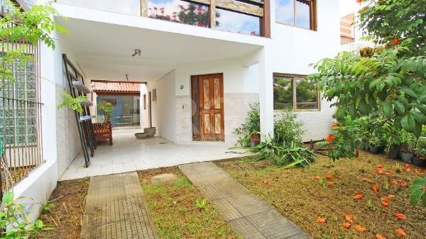 Casa à venda com 3 quartos, 177m², 1 suíte, 2 vagas, Rua Canisio Binsfeld no bairro Hípica em Porto Alegre