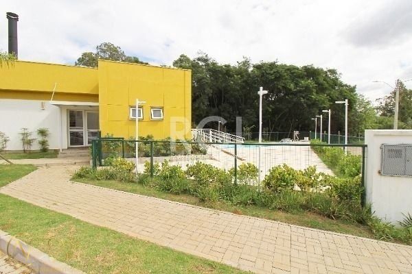 Casa de Condomínio à venda com 4 quartos, 115m², 2 suítes, Estrada Jorge Pereira Nunes no bairro Campo Novo em Porto Alegre