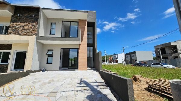 Casa de Condomínio à venda com 3 quartos, 143m², 1 suíte, 2 vagas, Estrada Jorge Pereira Nunes no bairro Campo Novo em Porto Alegre