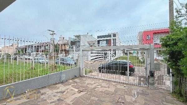 Casa à venda com 3 quartos, 127m², 1 suíte, 2 vagas, Rua Aldo Sani no bairro Hípica em Porto Alegre