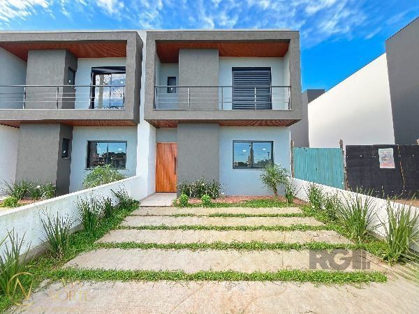 Casa à venda com 3 quartos, 120m², 1 suíte, 2 vagas, Rua Lucindo Antônio Bottin no bairro Hípica em Porto Alegre