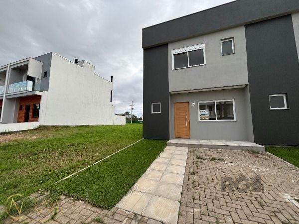 Casa de Condomínio à venda com 2 quartos, 99m², 2 suítes, 2 vagas, Estrada Jorge Pereira Nunes no bairro Campo Novo em Porto Alegre