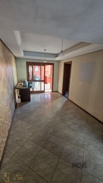 Casa à venda com 3 quartos, 168m², 1 suíte, 2 vagas, Rua Guatambu no bairro Hípica em Porto Alegre