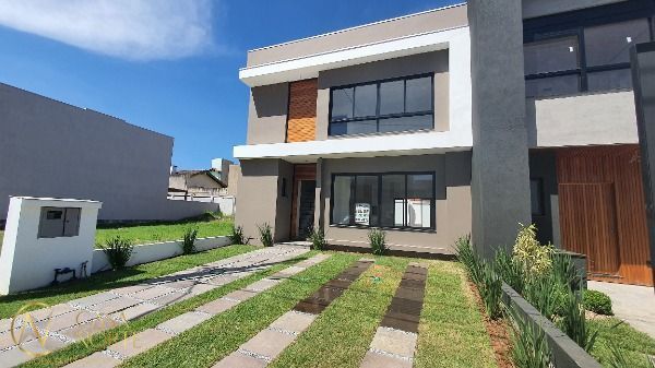 Casa de Condomínio à venda com 3 quartos, 147m², 3 suítes, 2 vagas, Rua Sinai no bairro Ipanema em Porto Alegre