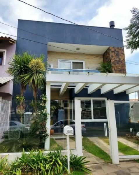 Casa à venda com 3 quartos, 154m², 1 suíte, 2 vagas, Rua Guatambu no bairro Hípica em Porto Alegre