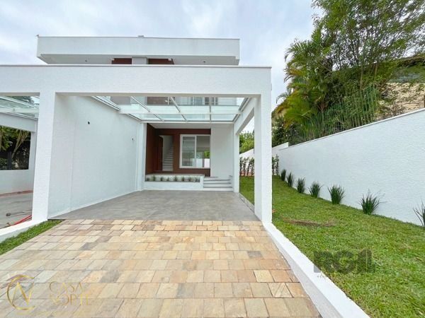 Casa à venda com 3 quartos, 155m², 1 suíte, 2 vagas, Rua Padre João Batista Reus no bairro Vila Conceição em Porto Alegre