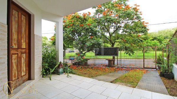 Casa à venda com 3 quartos, 177m², 1 suíte, 2 vagas, Rua Canisio Binsfeld no bairro Hípica em Porto Alegre