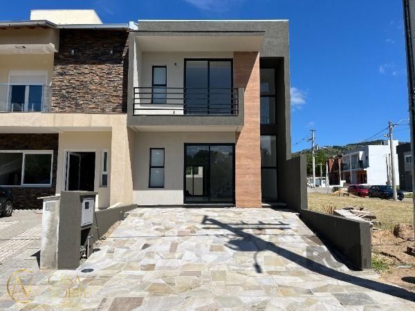 Casa de Condomínio à venda com 3 quartos, 143m², 1 suíte, 2 vagas, Estrada Jorge Pereira Nunes no bairro Campo Novo em Porto Alegre