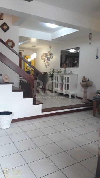 Casa à venda com 2 quartos, 110m², 2 suítes, 2 vagas, Rua Carlos Scliar no bairro Hípica em Porto Alegre