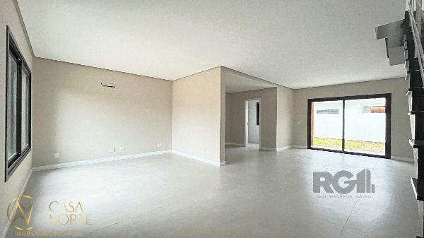 Casa de Condomínio à venda com 3 quartos, 136m², 1 suíte, 2 vagas, Rua Jean Vardaramatos no bairro Hípica em Porto Alegre