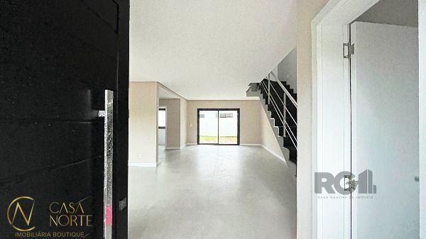 Casa de Condomínio à venda com 3 quartos, 136m², 1 suíte, 2 vagas, Rua Jean Vardaramatos no bairro Hípica em Porto Alegre
