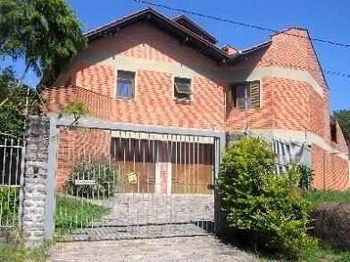 Casa à venda com 4 quartos, 600m², 4 suítes, 2 vagas, Irma Jacomina Veronese no bairro Jardim Isabel em Porto Alegre