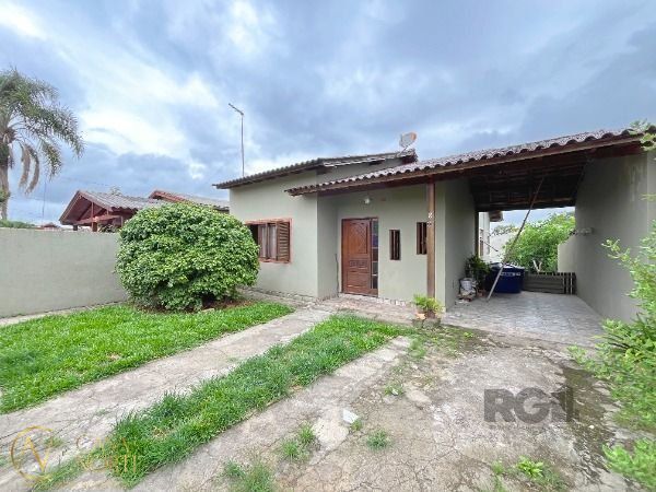 Casa à venda com 3 quartos, 80m², 2 vagas, Rua Bougainville no bairro Lageado em Porto Alegre