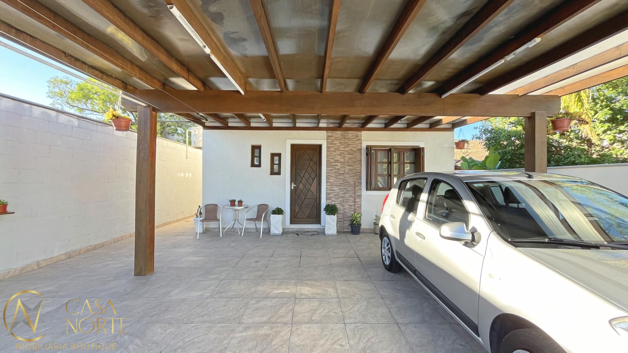 Casa à venda com 3 quartos, 154m², 2 vagas, Rua Stringhini no bairro Hípica em Porto Alegre