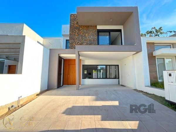 Casa de Condomínio à venda com 3 quartos, 177m², 3 suítes, 2 vagas, Rua Sinai no bairro Ipanema em Porto Alegre