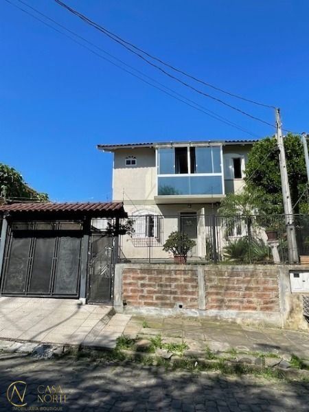 Casa à venda com 3 quartos, 91m², 1 suíte, 2 vagas, Rua Jóia no bairro Vila Nova em Porto Alegre