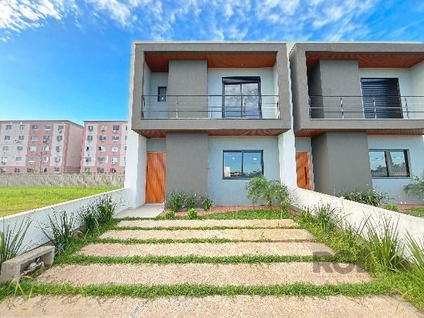 Casa à venda com 3 quartos, 120m², 1 suíte, 2 vagas, Rua Lucindo Antônio Bottin no bairro Hípica em Porto Alegre