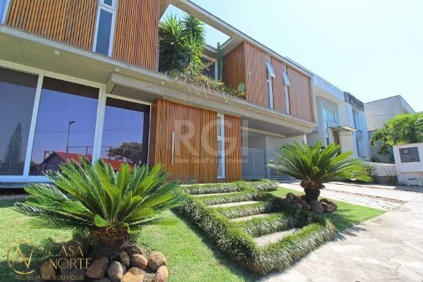 Casa de Condomínio à venda com 3 quartos, 278m², 3 suítes, 2 vagas, Rua Francisco Solano Borges no bairro Hípica em Porto Alegre